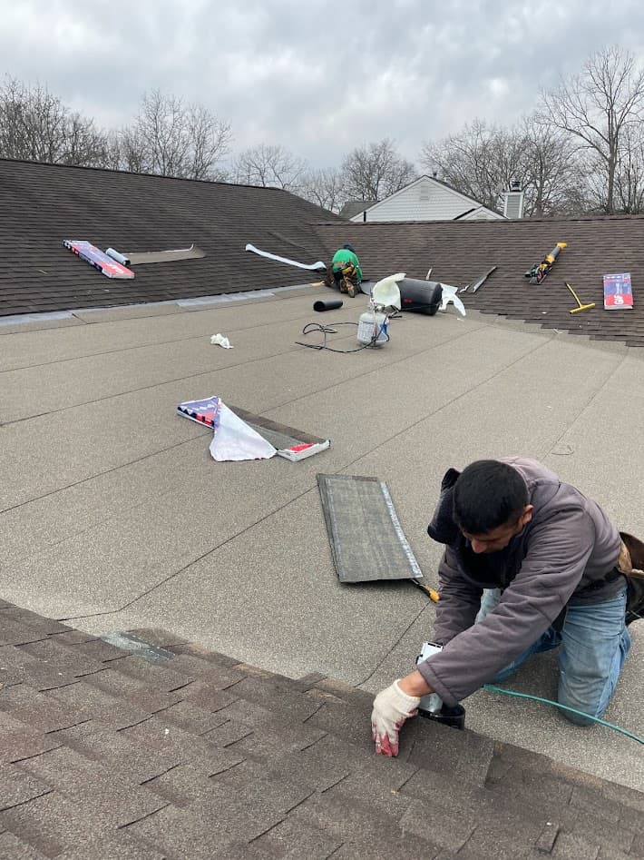 Flat roof repair in progress
