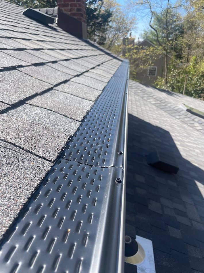 Shelter gutter guard system